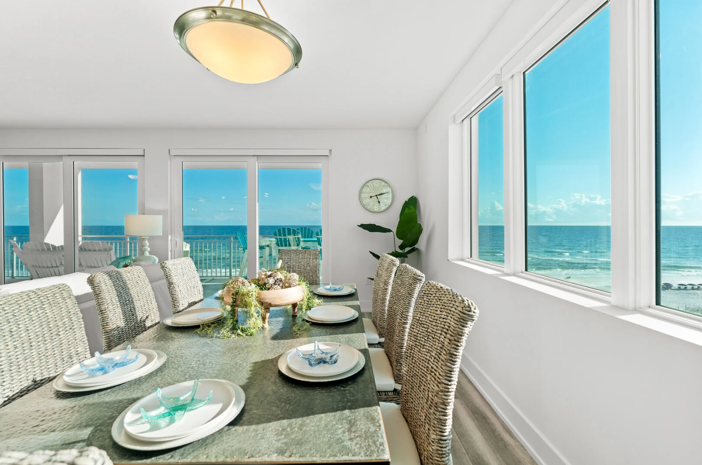 Dining room table set with clean plates and flatware